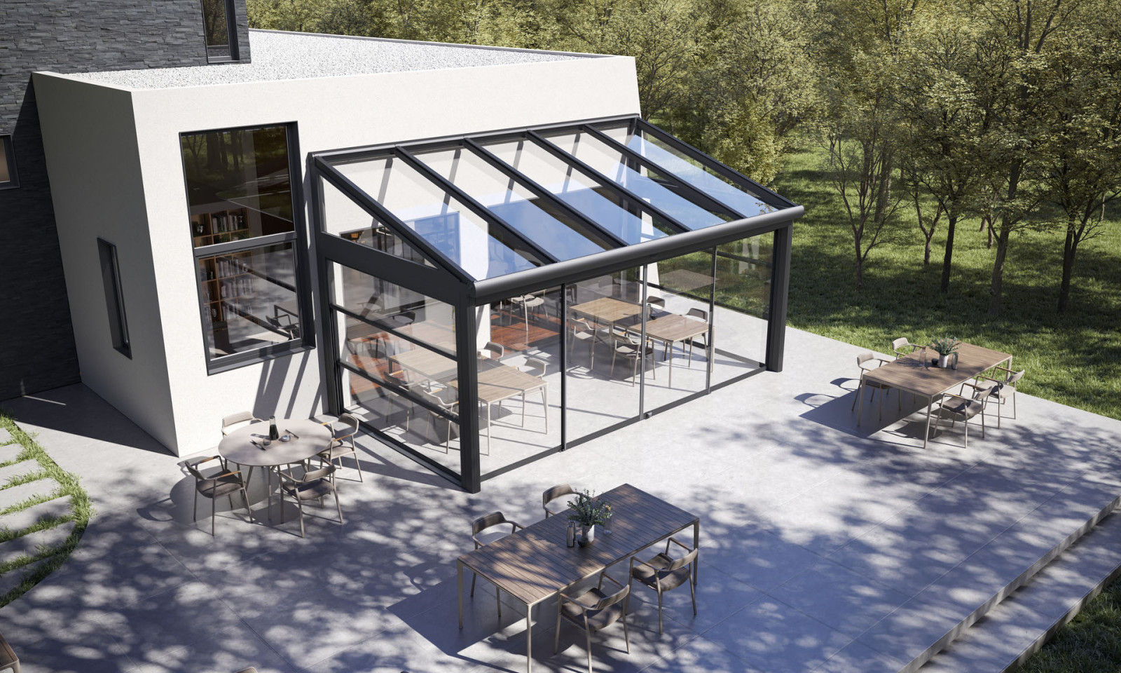 A contemporary house with a functional Winter Garden featuring a patio and a glass roof.