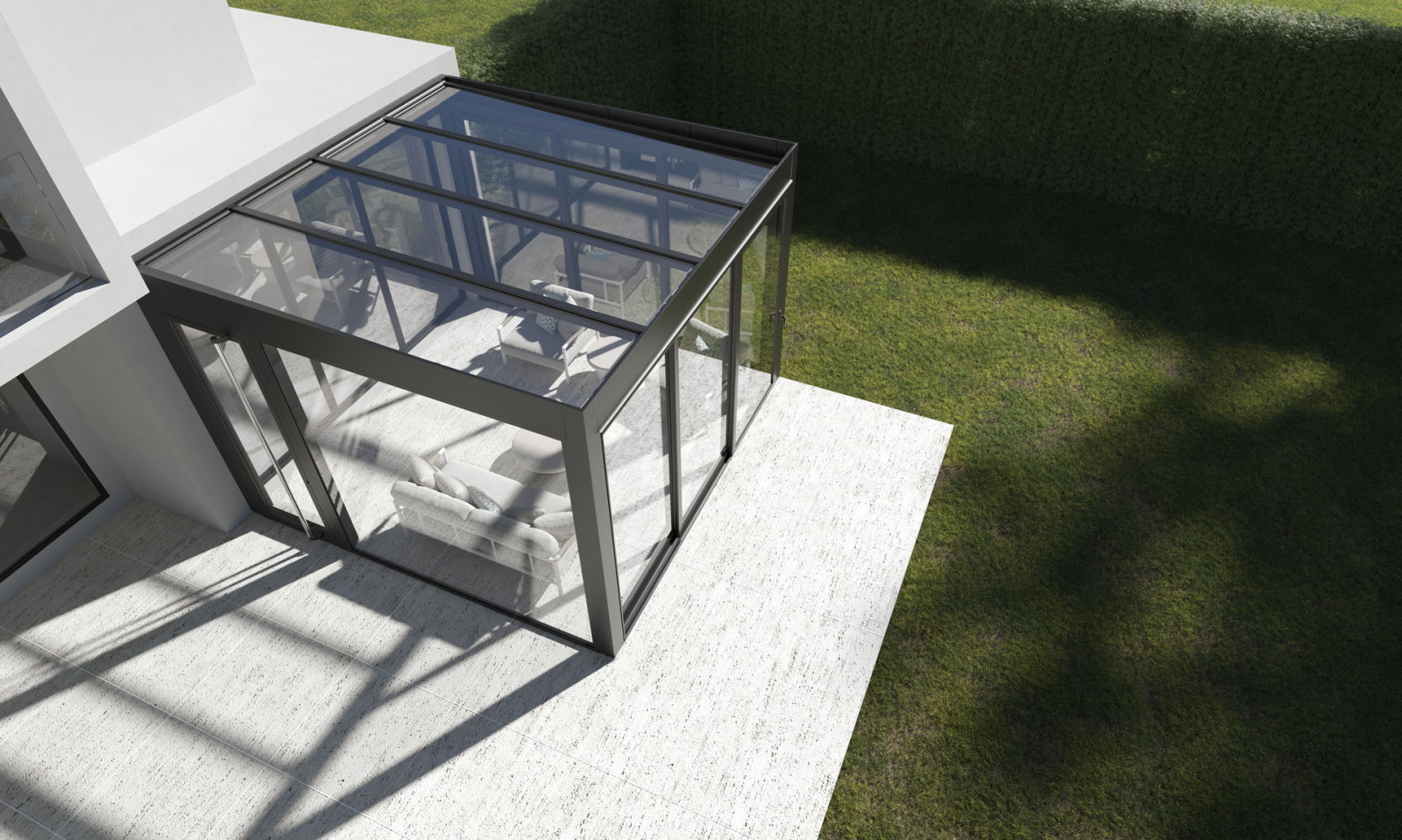 garden of a villa with transparent barrier, glass roof pergola and outdoor seating