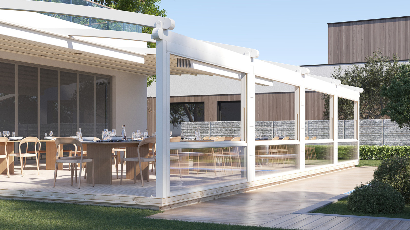 A yard patio featuring a table and chairs, with Parapet Systems in the background.