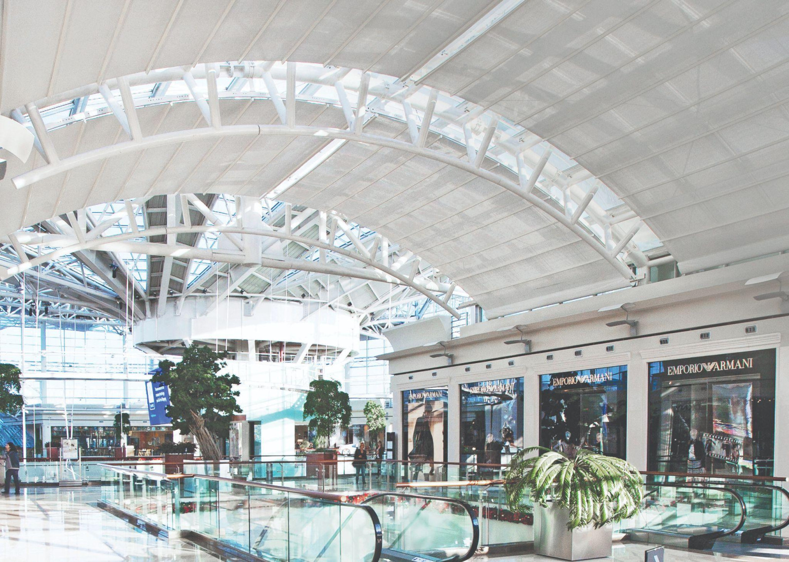 Large glass building and roof built for energy efficiency and space optimization.