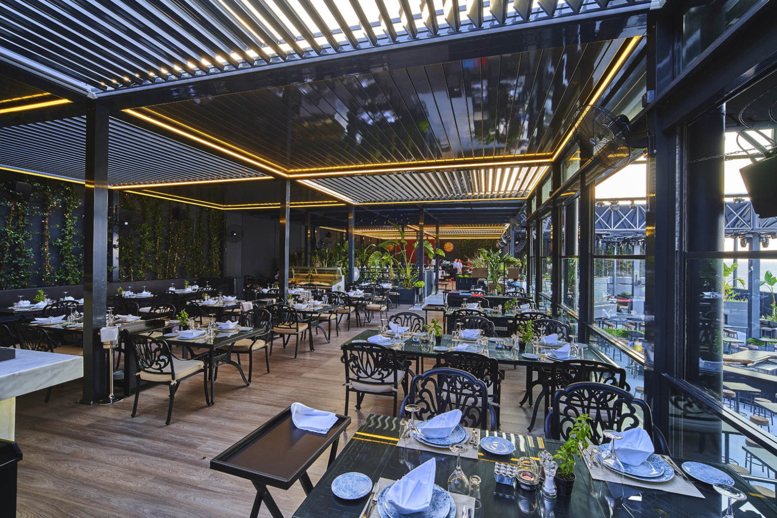 a pergola system designed with materials compatible with the space